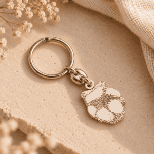 Llavero de plata personalizado con la huella real de una mascota